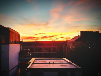 View of cityscape against sky during sunset