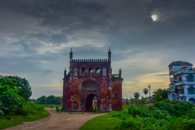 View of historical building against cloudy sky