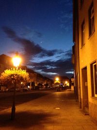 View of illuminated street at night