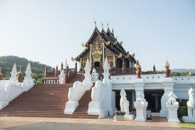 Exterior of temple against clear sky