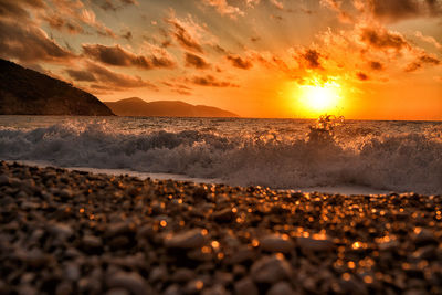 Scenic view of sea against sky during sunset