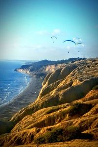 Scenic view of landscape against blue sky