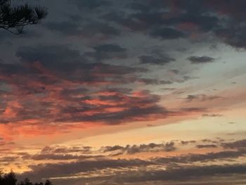 Low angle view of dramatic sky during sunset