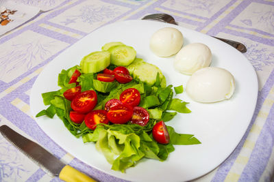 High angle view of salad in plate on table