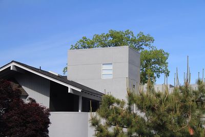 Low angle view of building against blue sky