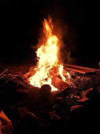Bonfire on field at night