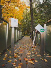 Text on footpath during autumn