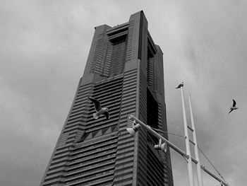 Low angle view of skyscrapers against sky