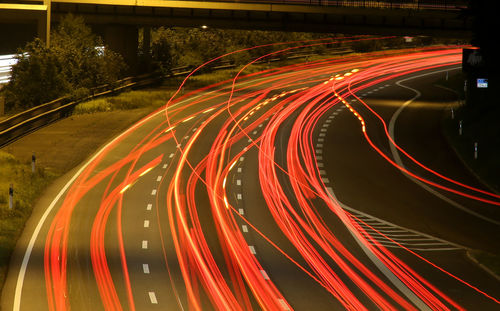 Light trails on road at night