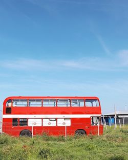 Train on field against sky