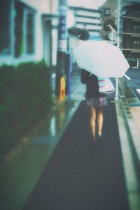 Woman standing in city