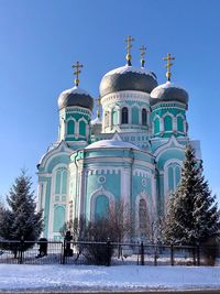 Building against clear sky during winter