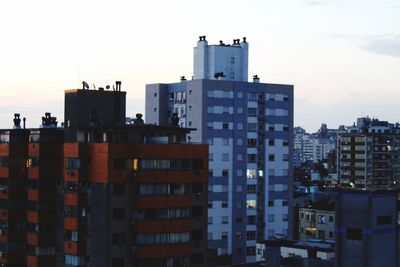 Buildings in city against sky