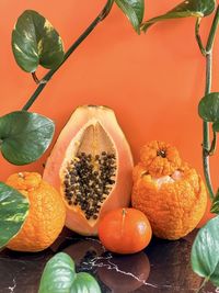 Close-up of orange fruits on table