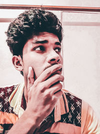 Portrait of young man looking away