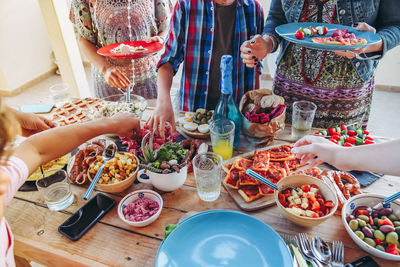 Summer aperitif with group of friends joy and festivities in family evening  dinner on the terrace 