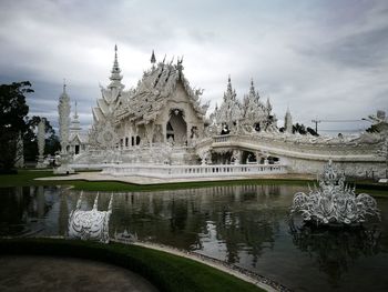 View of temple against cloudy sky