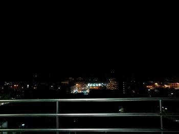 Illuminated cityscape at night