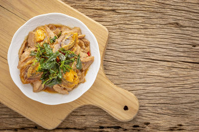 High angle view of salad in bowl on table