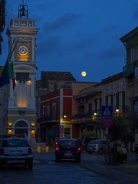 Cars on street at night
