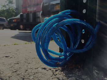 Blue car parked in city