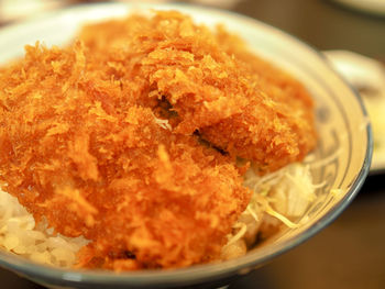 High angle view of food in bowl on table katsudon