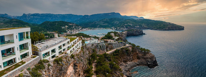 Aerial view of the luxury cliff house hotel on top of the cliff on the island of mallorca.