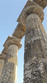 Low angle view of bell tower against sky