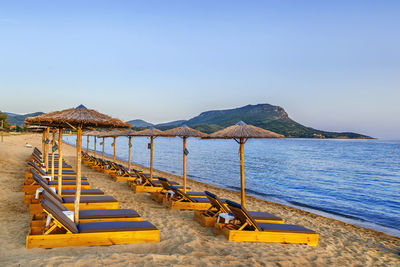 Scenic view of beach against clear sky