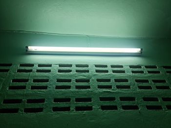 High angle view of illuminated lights on wall