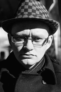 Close-up portrait of man wearing hat