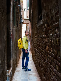 Full length of man standing in building