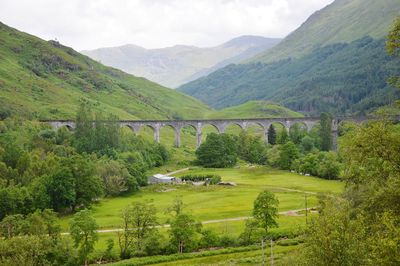 Scenic view of mountains  and viaduct against sky. here was shot a part of harry potter movie