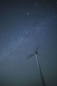 Low angle view of wind turbine against sky