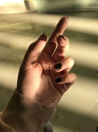 Close-up of hand holding hands