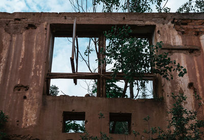 Low angle view of abandoned building