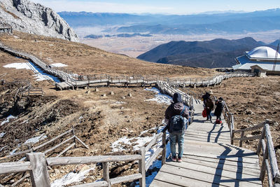 People walking on mountain road