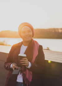 Cropped hand of woman holding ice cream