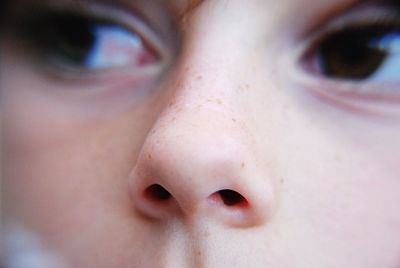 Close-up of boy looking away