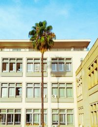 Low angle view of building against blue sky