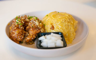 Close-up of food in plate on table