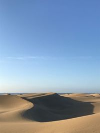 Scenic view of desert against sky