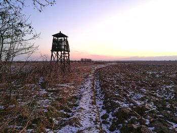 Scenic view of landscape against sky during sunset