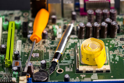 Close-up of objects on circuit board