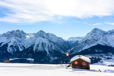 Snowcapped mountains against sky