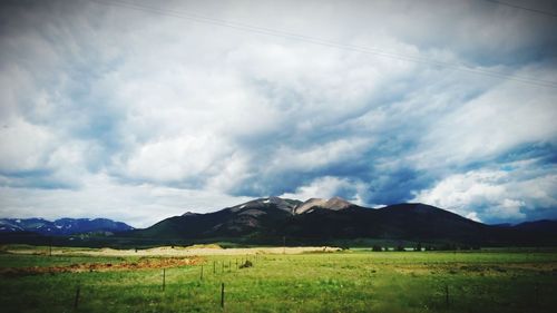 Scenic view of field against sky