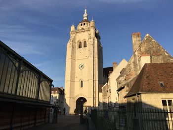 The notre-dame de dole roman-catholic church and the halles de dole, a restored market hall