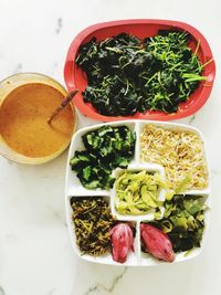 High angle view of salad in bowl on table