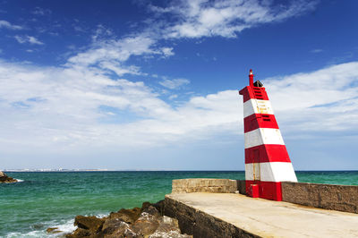 Lighthouse on seashore