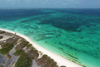 Drone view of beach with clear water in los roques, caribbean sea, venezuela